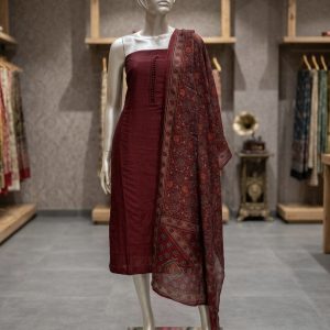 crimson & ajrakh: textured tussar unstitched suit set with traditional printed dupatta