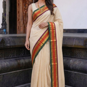 meera soft mul cotton saree from kerala features vibrant tassels and a distinct traditional border.