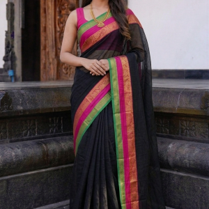 mizhi black mul cotton saree featuring a vibrant pink and green border with intricate zari work